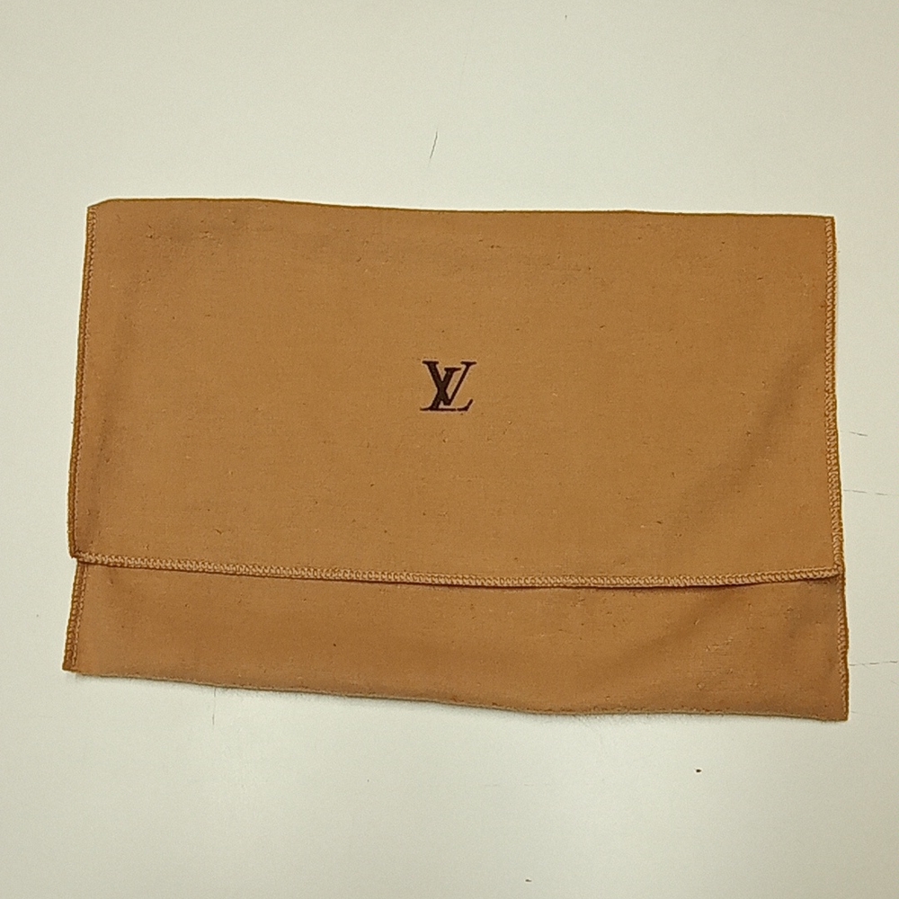 Louis Vuitton dust bag. 7.5 by 12in